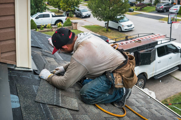 Professional Roofing technician working in Hague, NY